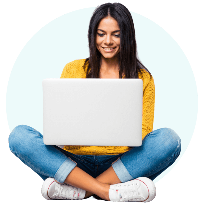 Female_student_sat_in_front_of_laptop